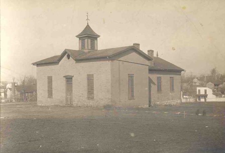 The Charlestown Academy shortly before it was torn down in 1912. The front section with the cupola was added in the 1876 time frame while Capt. Kable was Principal.